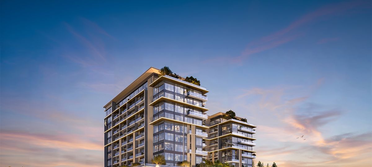Residential tower beside a lake at dusk