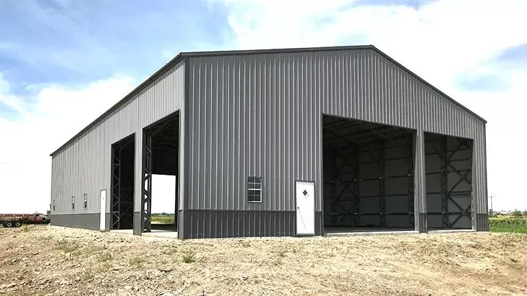 Steel warehouse building with large bay doors